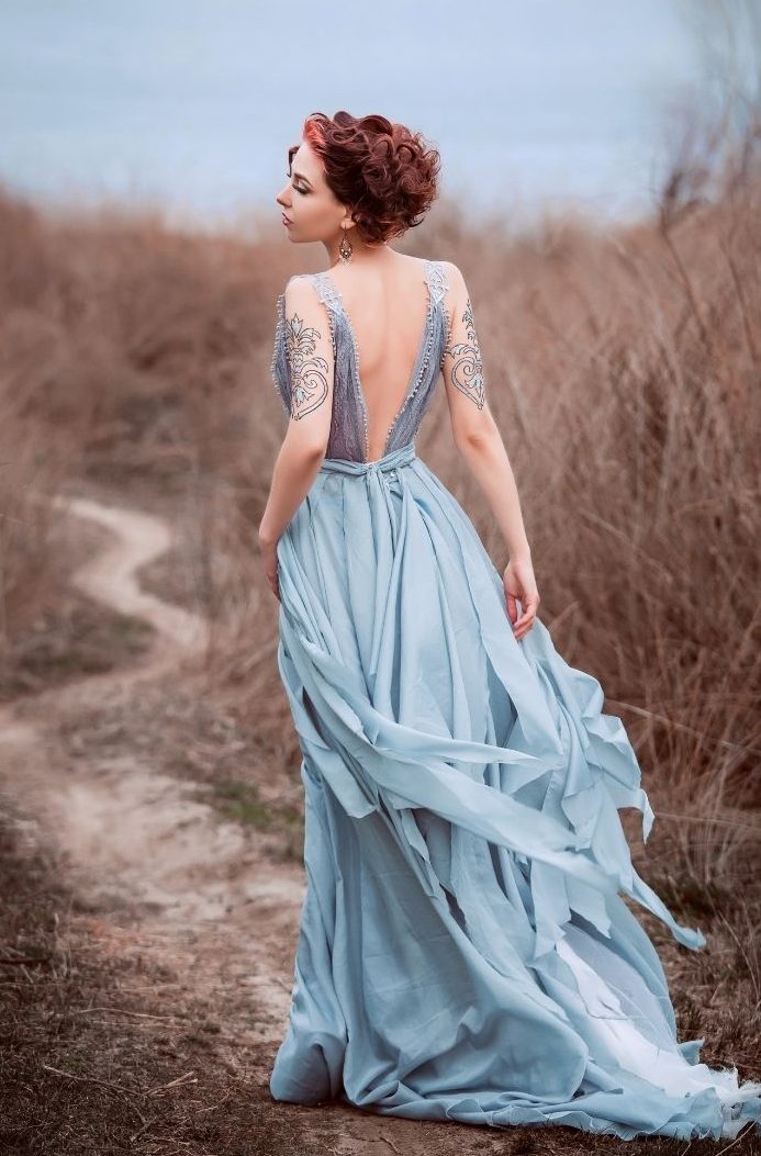 Redhead pale blue dress