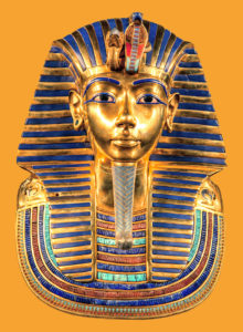 Egyptian pharoah Tutankhamun's burial mask on yellow background