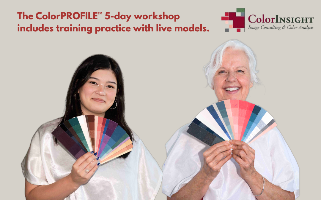 Two women who are modeling for color consultants training during the ColorPROFILE 5 Day Workshop in San Mateo, CA.
